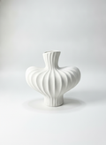 White ceramic vase.